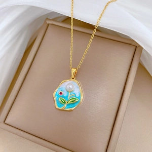 Floral enamel pendant necklace with pearl on beige box, gold titanium steel chain