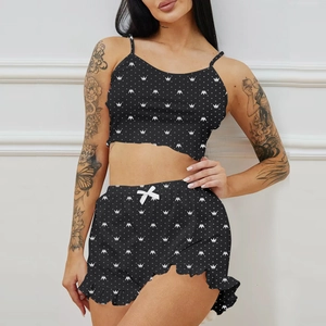 Women's two-piece sleepwear set with crown print camisole and ruffled shorts in black