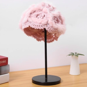 Pink handmade crochet beanie with rabbit fur trim and floral knit pattern for women