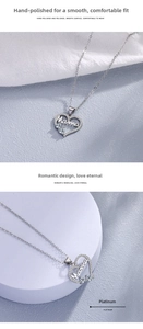 Detail of a platinum-colored heart pendant necklace with MAMA lettering and crystals