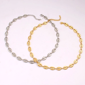 Detail of coffee bean link chain necklaces in gold and silver stainless steel with lobster clasp