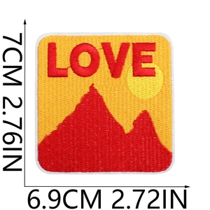 Detailed embroidery patch with LOVE lettering and red mountain design showing 7cm dimensions