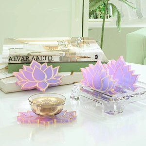 Purple lotus resin coaster set with gold trim, including storage stand and matching teacup