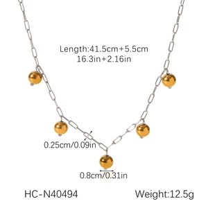 Detail showing two-tone beaded necklace length of 41.5cm plus 5.5cm extension chain