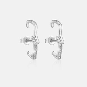 Detail of S925 sterling silver wavy stud earrings with micro-inlaid zirconia stones