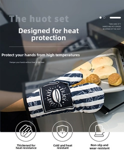 Thick blue striped oven mitt holding a hot baking tray in a modern kitchen setting