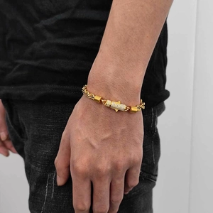 Detailed view of 6mm gold twisted rope bracelet featuring a diamond-encrusted lock clasp