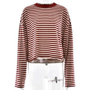 Women's trendy red and white striped long sleeve crewneck t-shirt in a relaxed fit