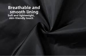 Macro shot of breathable black lining fabric showing smooth texture and soft pleats