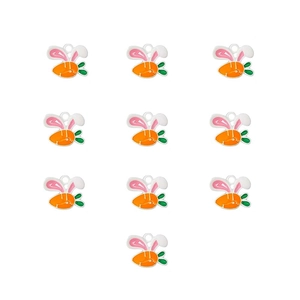 Macro view of ten painted carrot pendants with rabbit ears for DIY jewelry accessories