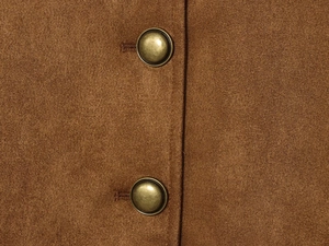 Detail shot of caramel suede jacket featuring vintage bronze semi-circular buttons