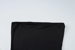 Detail of black elastic fabric and texture on the tube top set for women
