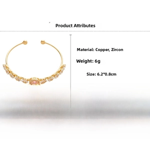 Detailed view of gold copper bangle showing 6.2cm inner diameter and 0.8cm width