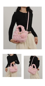 Pink quilted crossbody bag detail with golden bow accent and plush charm accessory