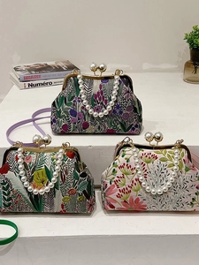 Elegante chinesische Vintage-Stoffhandtasche mit Perlengriff und Metallverschluss