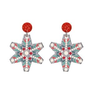 Christmas star earrings with red glitter studs and colorful polka dot snowflake patterns