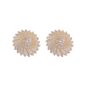 Sparkling zircon sunflower stud earrings in gold finish with radiant crystal petals