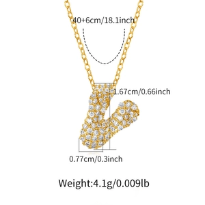 Detailed macro view showing the size dimensions and weight of the gold letter V necklace