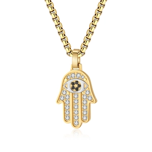 Luxurious gold Hamsa Hand pendant necklace with sparkling clear and black crystals