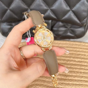Macro view of gold watch dial with luxury diamond spinning snowflake design