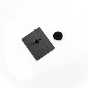 Black rectangle enamel pin back view featuring matte texture and rubber butterfly clutch