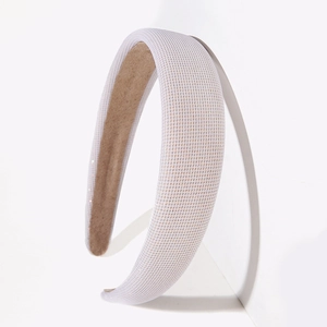 Minimalist vintage white mesh sponge headband for women in a modern studio setting