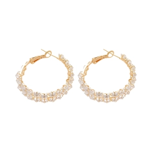 Boucles d'oreilles cercle géométrique en argent avec finition dorée et zircons brillants