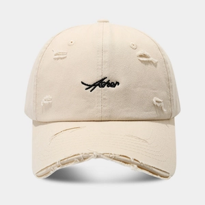 Vintage beige cotton baseball cap with distressed details and black Ashore embroidery