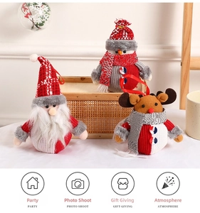 Detailed view of handmade plush Christmas tree ornaments featuring Santa, snowman and deer