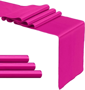 Detailed view showing the glossy texture and elegant drape of the fuchsia satin table runner