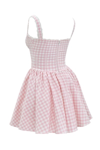 Detail of pink and white checkered dress back featuring lace trim and hidden zipper