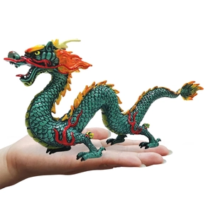 Realistic green Chinese dragon figurine with intricate scales and vibrant orange mane