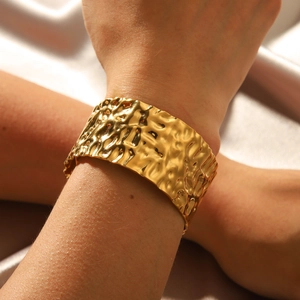 Luxurious 18K gold plated stainless steel wide cuff bracelet with hammered texture for women