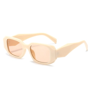Retro cream square sunglasses with peach lenses shown in a stylish 45-degree side view
