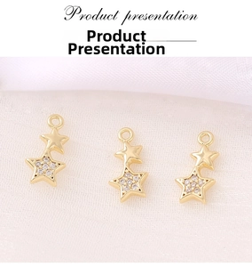 Detail of gold star charms with micro-pave zircons for DIY jewelry making and crafts