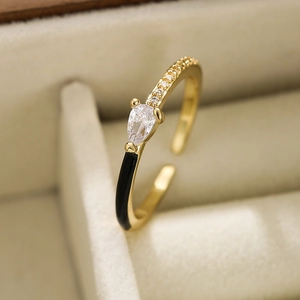 Elegant 18K gold plated copper ring with black enamel and sparkling zircon accents