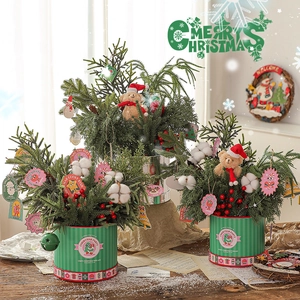 Miniature Christmas tree desk decor with plush teddy bear and berries in green metal pots
