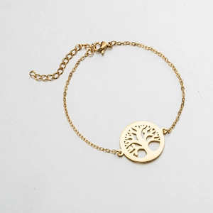 Detail of gold stainless steel bracelet with tree of life pendant and adjustable chain