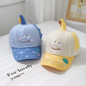 Cartoon dinosaur kids baseball cap with 3D fins and embroidered DINOS text detail