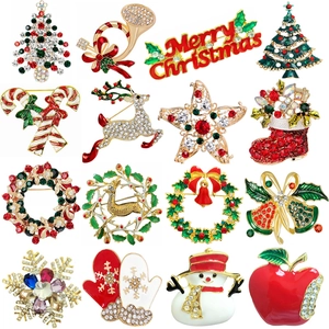 Collection of 16 different Christmas brooches including reindeer, snowmen and trees