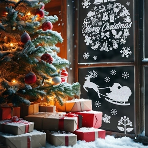 White glittery Merry Christmas window clings with reindeer and snowflake decals