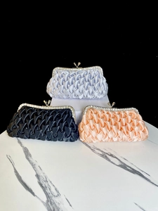 Elegant pleated silk evening clutch bag with rhinestone clasp, ideal for weddings and banquets.