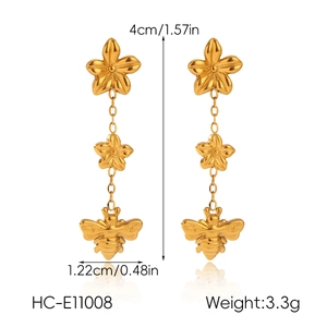 Detailed view of 18k gold bee and flower drop earrings with dimensions and weight specs