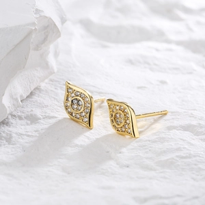 18K gold-plated bow-shaped eye stud earrings with micro-set zircons on a stone block