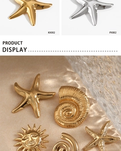 Detail showing gold and silver starfish and conch charms with polished finish
