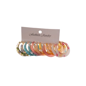 Set of 6 leopard print acetate C-shape hoop earrings on a fashion jewelry card