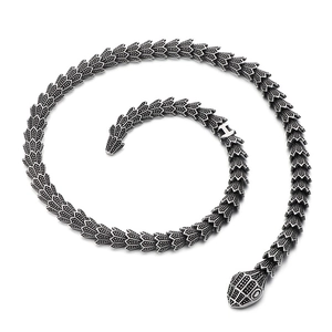 Vintage silver punk snake necklace in textured titanium steel with antique finish detail