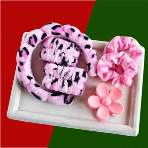 Pink plush leopard set with spa headband, wristbands, velvet scrunchies and flower hair clip