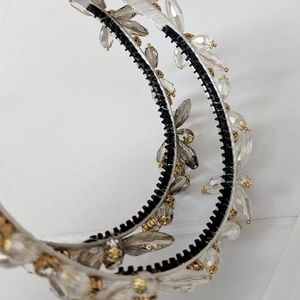 Detailed view of handmade crystal headbands with sparkling beads on anti-slip black rings