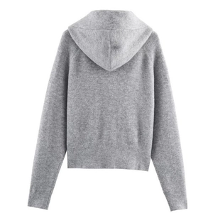 Back view of a casual grey oversized knitted hoodie with ribbed cuffs and drop shoulders